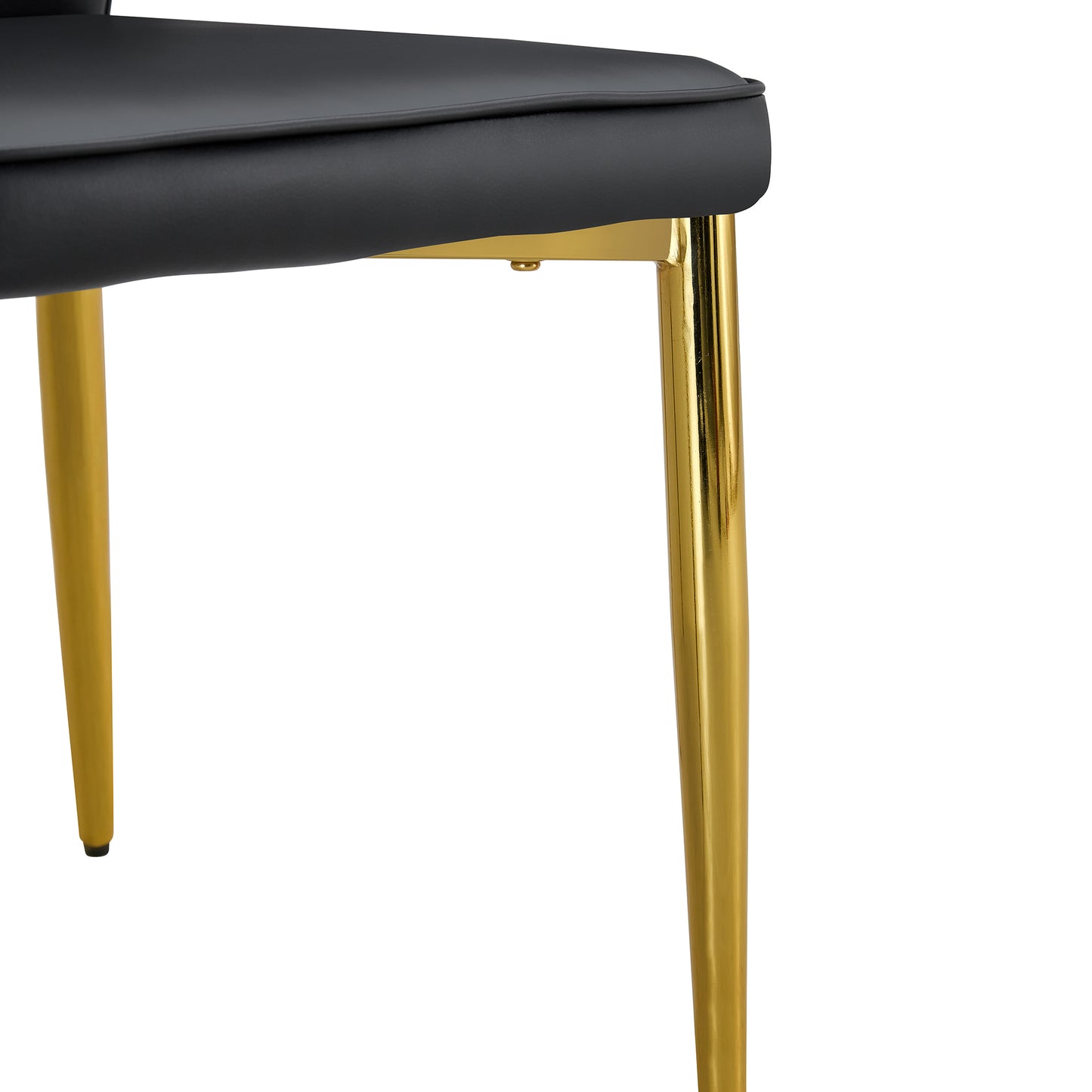 Four Black and Gold Dining Chairs