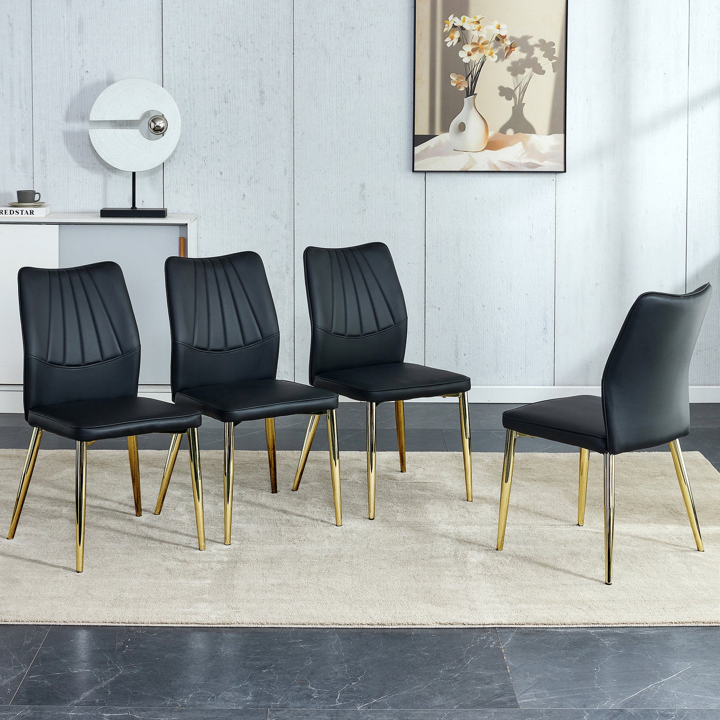 Four Black and Gold Dining Chairs