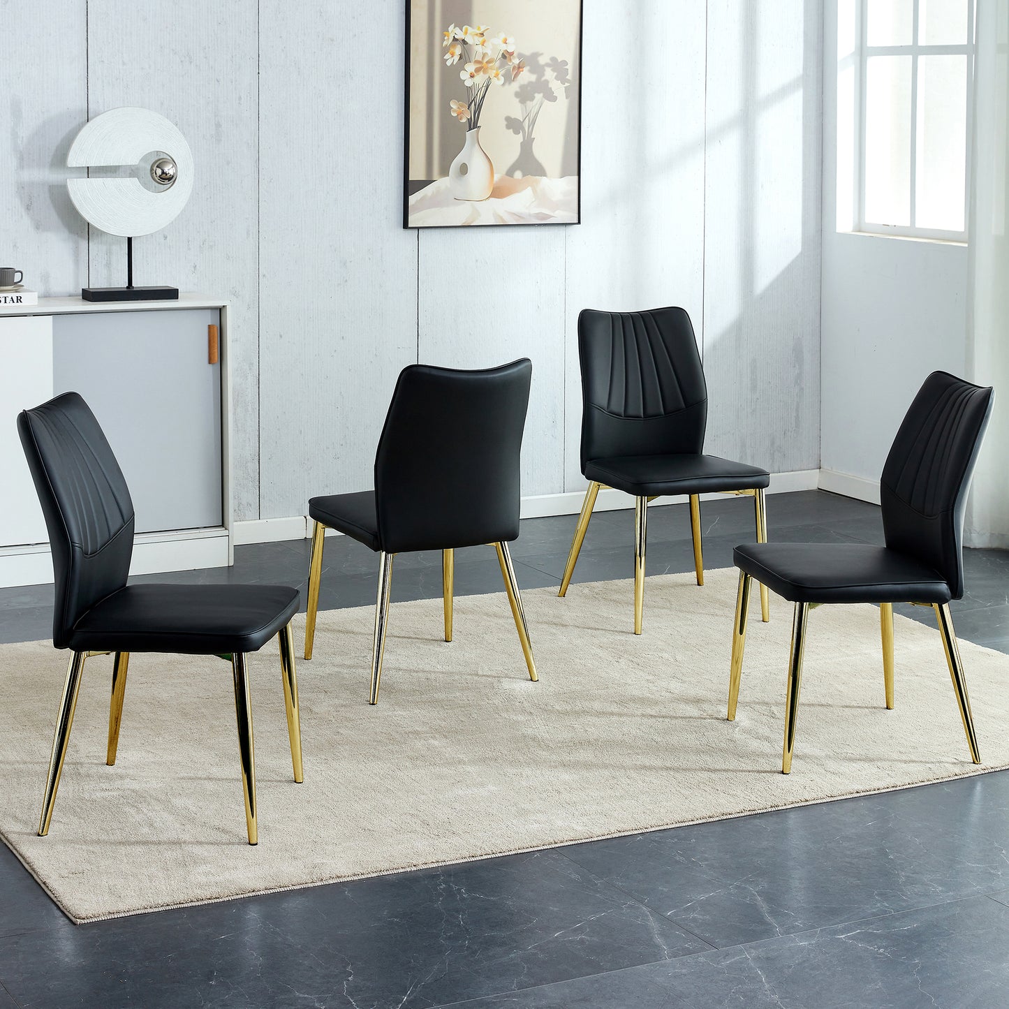 Four Black and Gold Dining Chairs