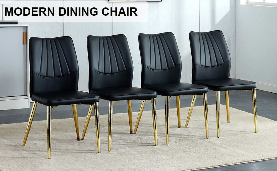 Four Black and Gold Dining Chairs